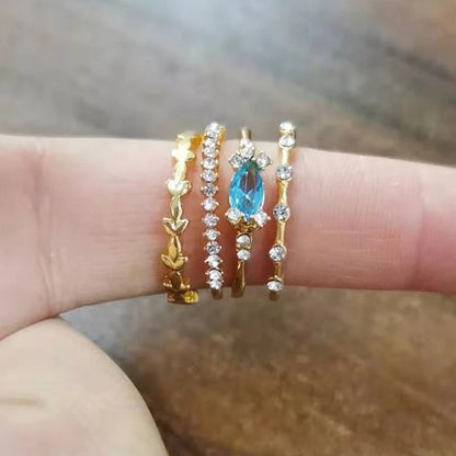 Set of 4 women's rings with flower crystal, party or engagement.