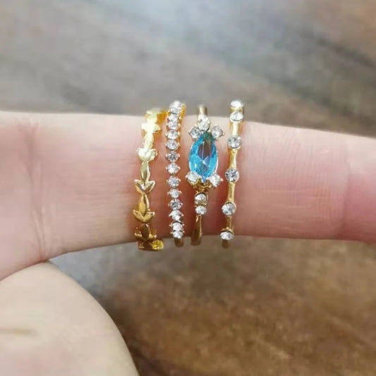 Set of 4 women's rings with flower crystal, party or engagement.