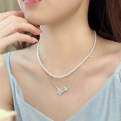 Silver butterfly set for women with crystals.